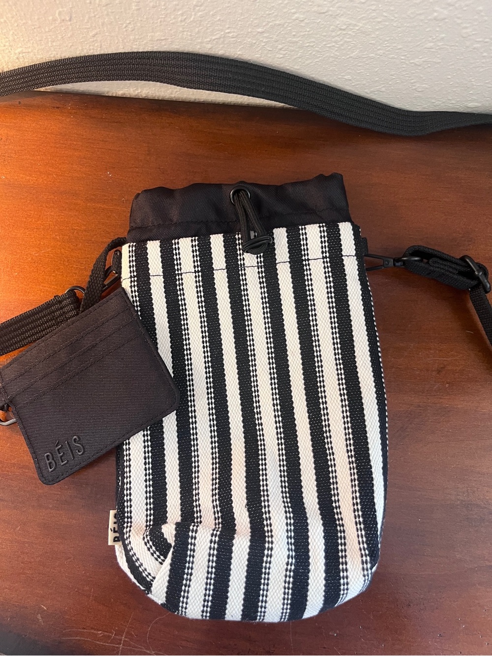 Beis brand water bottle sidekick with attached card case in black and white